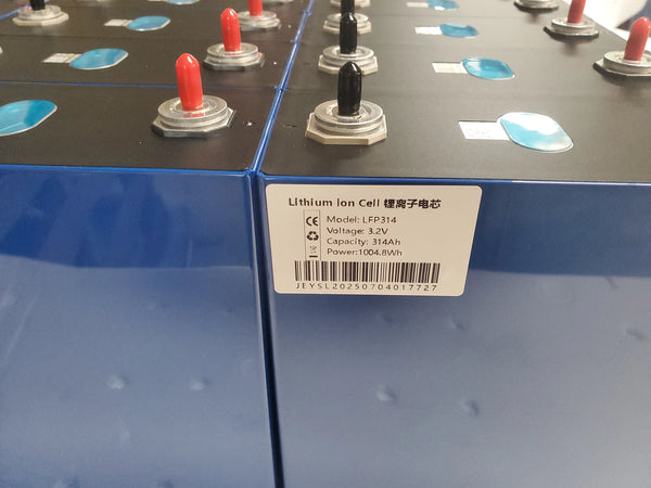 Real 314Ah prismatic LiFePO4 cells with visible model, voltage and capacity markings for identity and batch-record checks